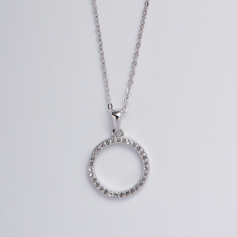 Sterling Silver Circle of Life Necklace with White Topaz