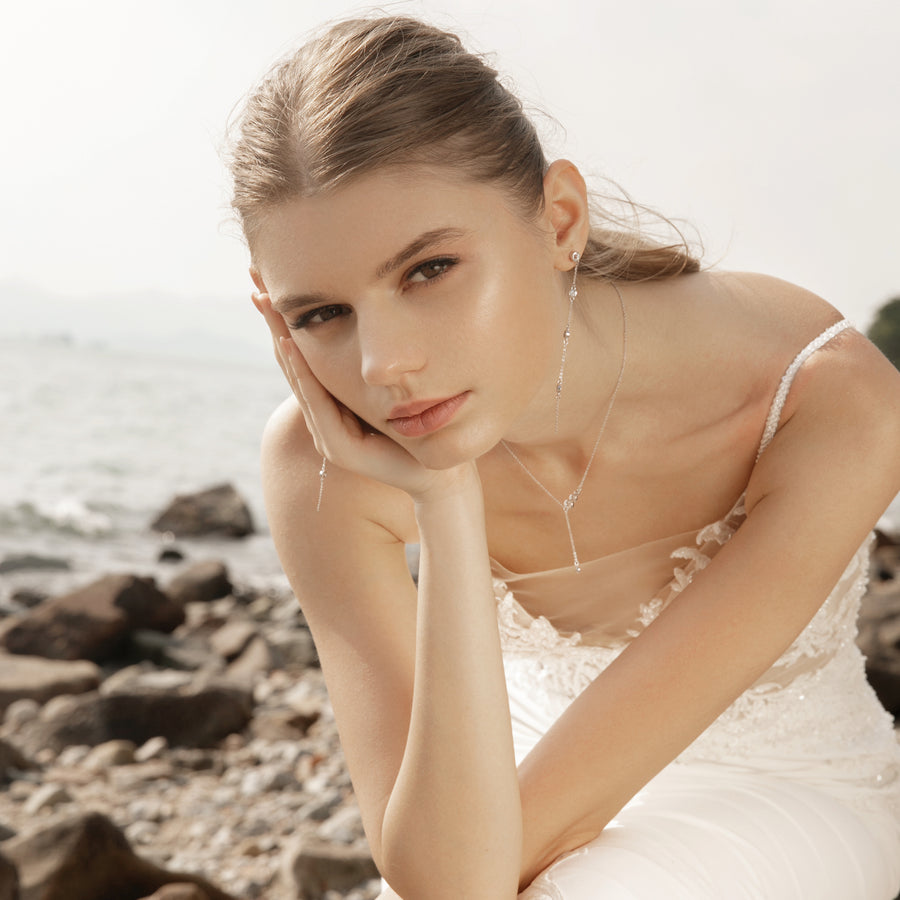 Sterling Silver Dangling Earrings with White Topaz