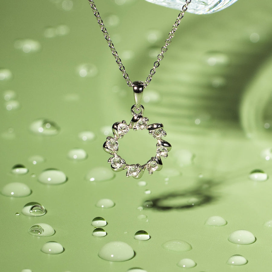 Sterling Silver Circle of Life Necklace with Natural White Topaz